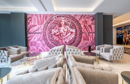 Avsallar Hotel | Exquisite Granada Red: Indulge in Poolside Relaxation