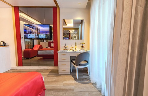 Avsallar Hotel | Exquisite Granada Red: Indulge in Poolside Relaxation