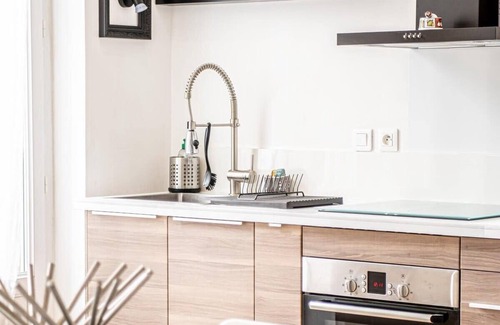 1st Arrondissement Apartment | Spacious 2-Bedroom with Balcony at Parc Longchamp