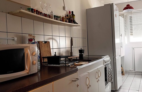 Porte d'Asnieres Apartment | Modern Grand Appart with Pool and Spa Amenities