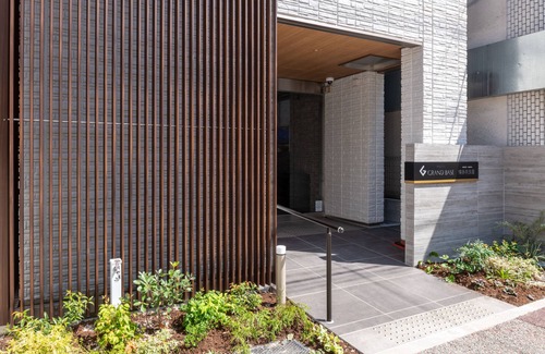 Hakata-ku Apartment | Discover GRAND BASE Hakata Naraya: Eco-Friendly Comfort