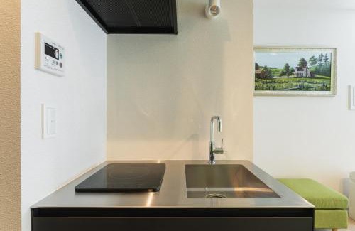 Kitakyushu Apartment | Accessible Comfort at GRAND BASE Mojiko - 8/10 Guest Rated