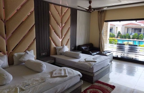 Mandarmani Hotel | Relax at Grand Beach Resort with Pool and Family-Friendly Perks