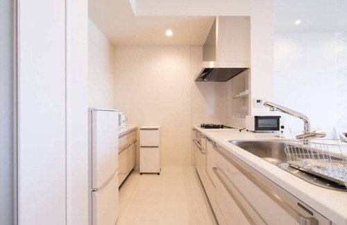 Maeda Apartment | Grand Blue 206: Exceptional Stay with Kitchen & Breakfast