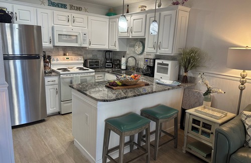 Ono Island Condo | Experience Grand Caribbean 112 West: Beachfront Condo Oasis