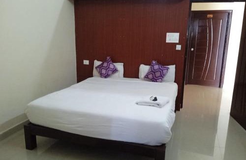 Gundlupet Hotel | Convenient Stay at GRAND JP INN Near Gundlupet Bus Stand
