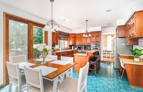 Grand Rapids Cabin | Premier Grand Rapids Retreat with Private Boat Dock & Spa