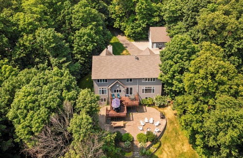 Grand Rapids Cabin | Premier Grand Rapids Retreat with Private Boat Dock & Spa