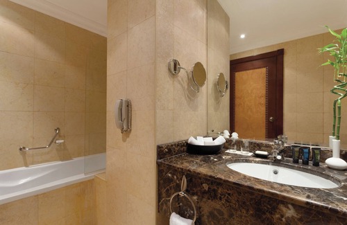 Al Sadd Hotel | Grand Regency Doha: Poolside Relaxation & Spa Bliss