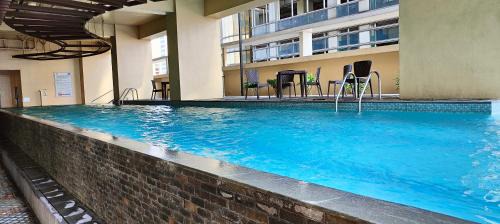 Ermita Bed & Breakfast | Affordable Comfort at Grand Riviera Suites with Pool Access