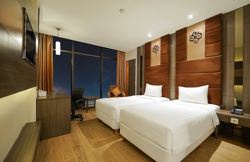 Tanjung Duren Utara Hotel | Discover Grand Tjokro Jakarta: 4-Star Comfort & Dining