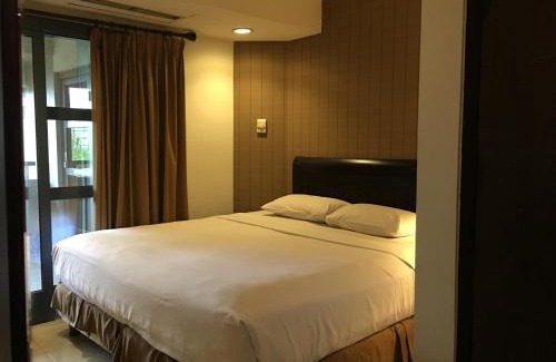 Tanjung Duren Utara Hotel | Discover Grand Tropic Suites Hotel with Pool & Family Fun