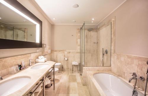 San Teodoro Hotel | Relax at Grande Baia Resort & Spa - Oceanfront Oasis Awaits