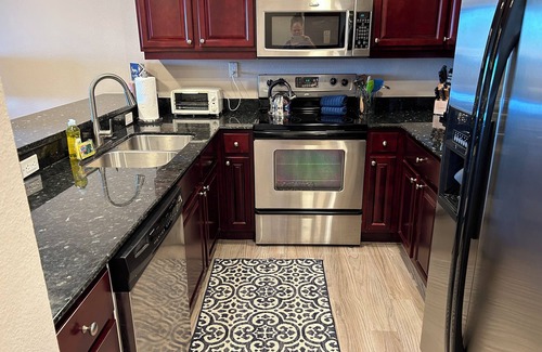 Estate Enighed Condo | Summer Special at Grande Bay: Renovated with Ocean View!