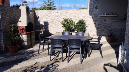 Lizzano Apartment | Charming Grande Bilocale with Garden & Family-Friendly Amenities
