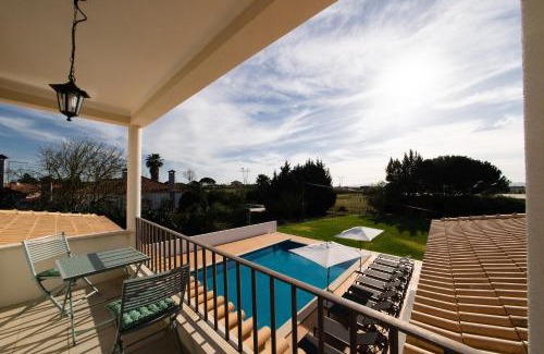 Cajados Villa | Discover Grande Setubal Villa: Oceanfront 5-Bedroom Retreat