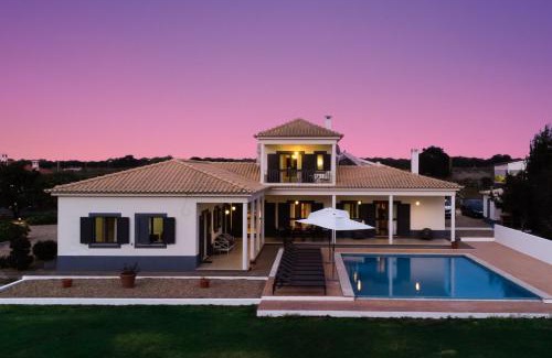 Cajados Villa | Discover Grande Setubal Villa: Oceanfront 5-Bedroom Retreat