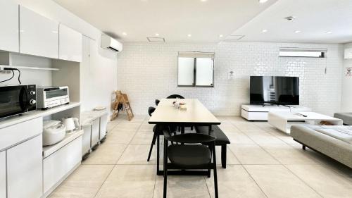 Onna House | Unforgettable Stay at Grandioso Onna 7-D: Poolside Bliss