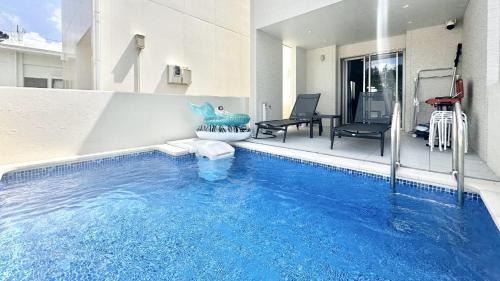Onna House | Grandioso Onna 7-D: Family-Friendly Retreat with Pool