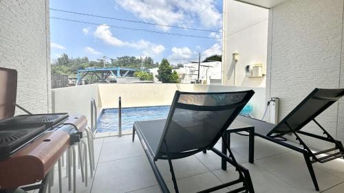 Onna House | Grandioso Onna 7-D: Family-Friendly Retreat with Pool