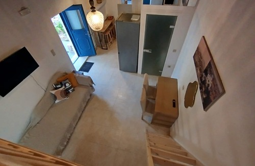Lagoudi Zia Apartment | Experience Grandpa's Place: Historic Home by Zia's Balcony