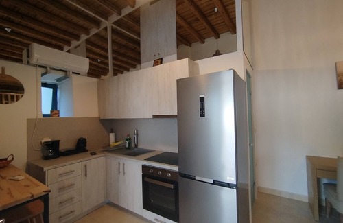 Lagoudi Zia Apartment | Experience Grandpa's Place: Historic Home by Zia's Balcony