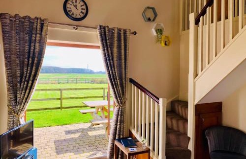 Wressle House | Relax at Grange Farm Cottages: 4-Star Comfort Awaits