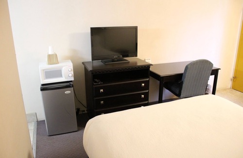 North East Hotel | Budget-Friendly Stays at Red Carpet Inn with Breakfast & Kitchen