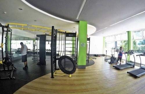Santo Cristo Apartment | Cozy Stay at Grass Residences SM North with Pool & Kitchen