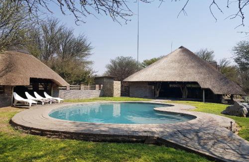 Ghanzi Cabin | Experience Nature at Grassland Safari Lodge with Ocean Views