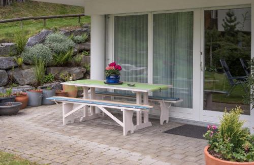 Laax Apartment | Grava: Cozy Retreat for Couples with Top Guest Ratings