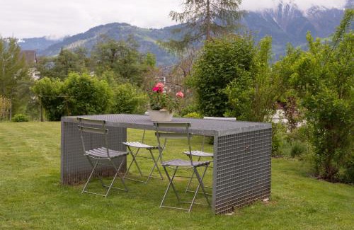 Laax Apartment | Grava: Cozy Retreat for Couples with Top Guest Ratings