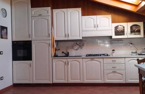 Caprino Veronese House | Guest Rated 10/10: Graziosa Mansarda with Kitchen Access