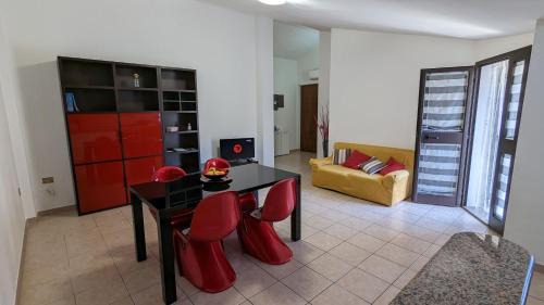 Gonnesa Apartment | Cozy Attic Retreat with Kitchen, Child-Friendly Amenities