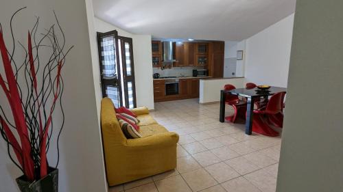 Gonnesa Apartment | Cozy Attic Retreat with Kitchen, Child-Friendly Amenities