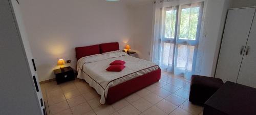 Gonnesa Apartment | Cozy Attic Retreat with Kitchen, Child-Friendly Amenities