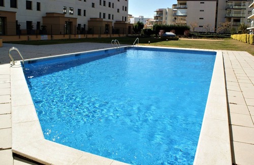 Santa Margarida Apartment | Beachside Apartment with Ocean Views and Pool Access