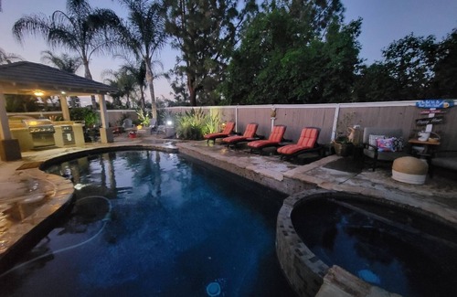Corona House | Inviting Backyard Oasis with BBQ, Pool & Spa Retreat