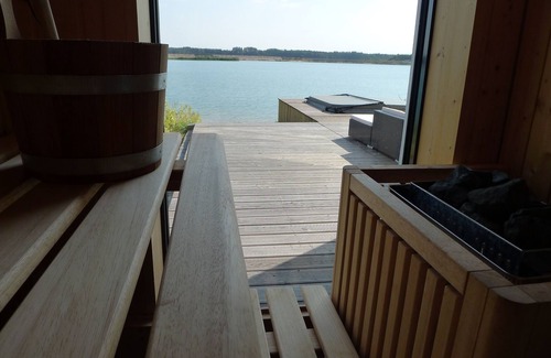 Lobnitz House | Inviting Getaway with Fireplace and Sauna by the Lake