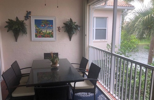 Whisper Trace Condo | Idyllic Lake View Retreat in Fiddler's Creek with Spa