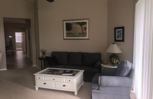 Whisper Trace Condo | Idyllic Lake View Retreat in Fiddler's Creek with Spa