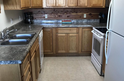Roach House | Serene Lakefront Log Home with Spa and Scenic Views
