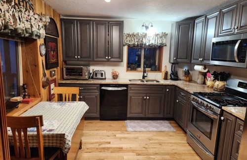 Featherville Cabin | Majestic Mountain Cabin Retreat with Pool and Lake Views