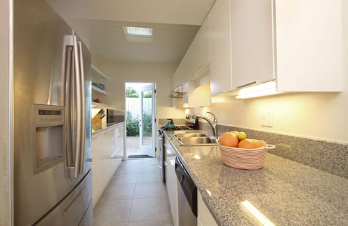 Racquet Club Estates House | Immaculate Retreat with Ocean Views and Friendly Service