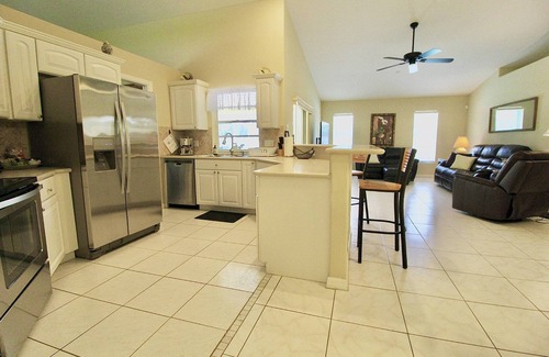 Port Saint Lucie House | Relax at Banana Tree Casa with Heated Saltwater Pool
