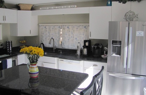 Sandalwood Village House | Book Your Golf Weekend at Mashpee Commons – Rated 10/10!