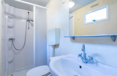 Aquileia House | Oceanfront Getaway at Green Holiday by Interhome