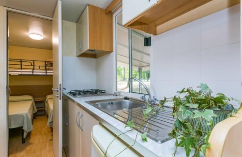 Aquileia House | Oceanfront Getaway at Green Holiday by Interhome