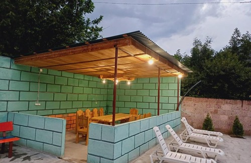 Kaputan House | Family-Friendly Green House with Pool Access for Your Stay