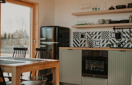 Wiartel Cottage | Relaxing Green Lake Front House with Ocean Views & Spa